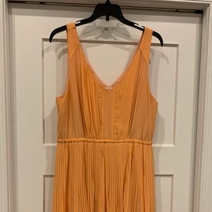 Orange pleated dress